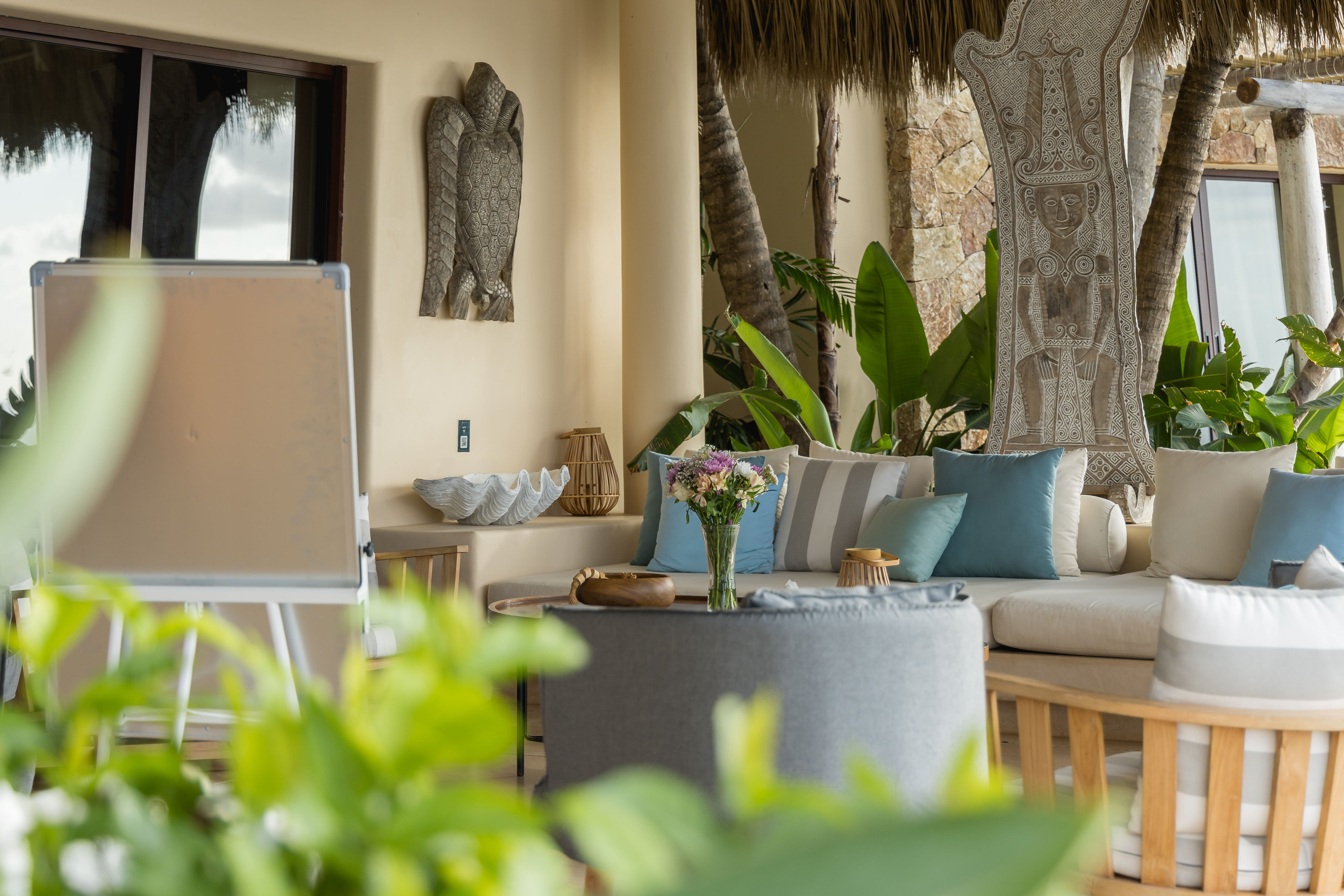 Sayulita Wellness Retreat — integration lounge with tribal art and ocean light